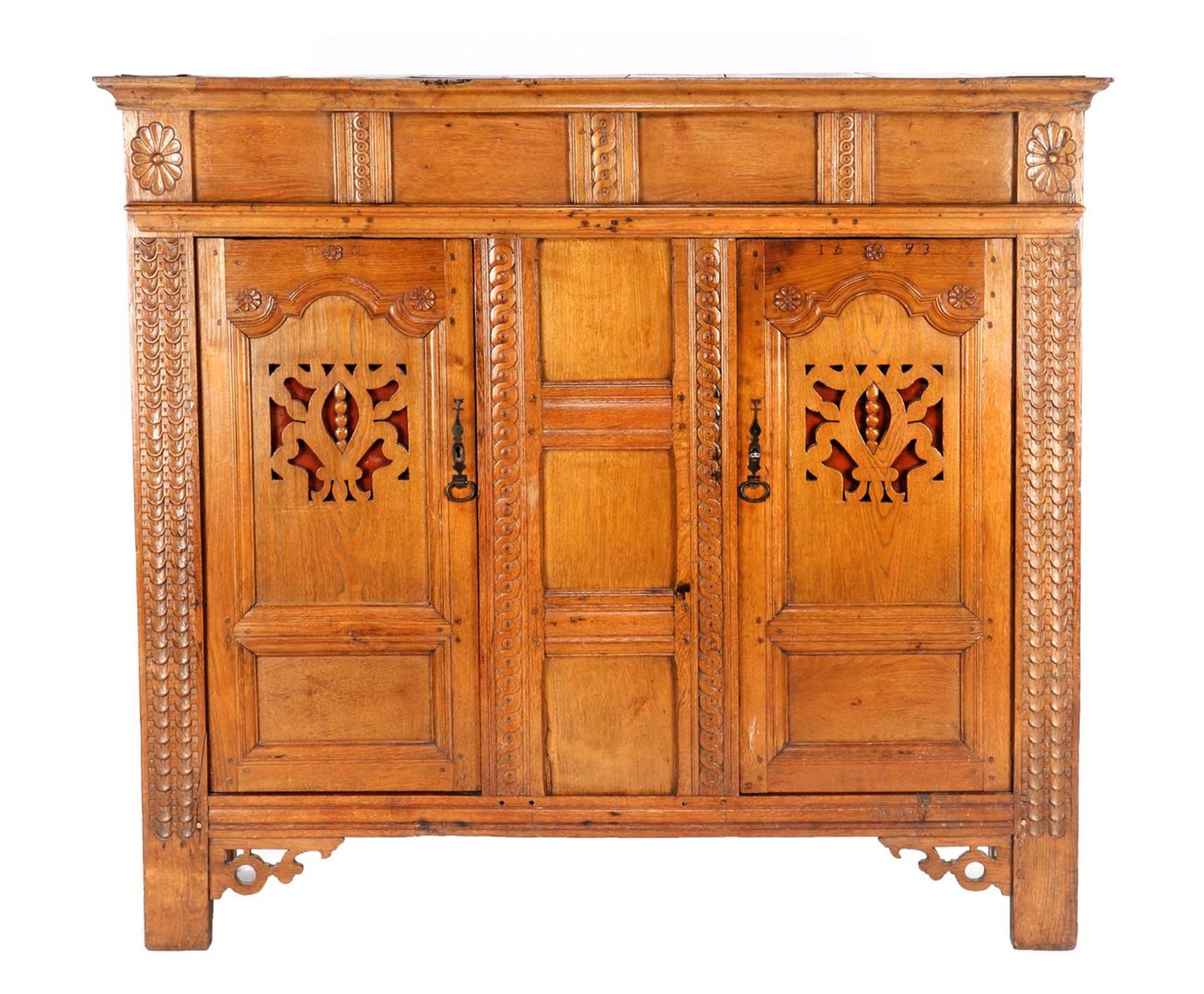 Antique oak cabinet with richly carved décor