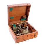 Brass sextant in walnut color teak box