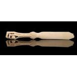 Richly carved ivory bookmark decorated with a bird's leg