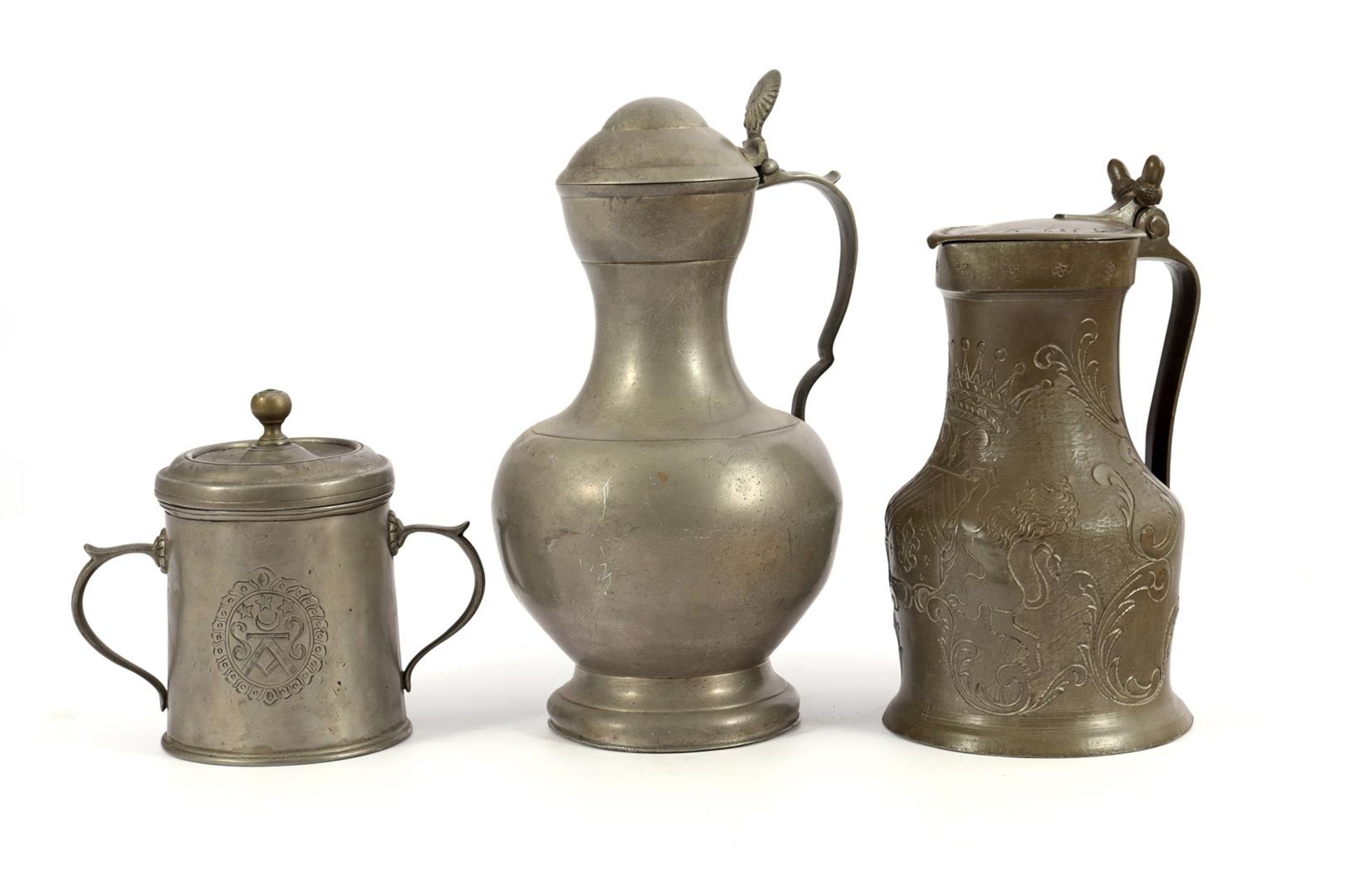 3 antique pewter jugs, incl. with engraved coat of arms