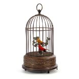 Copper bird cage with imitation birds