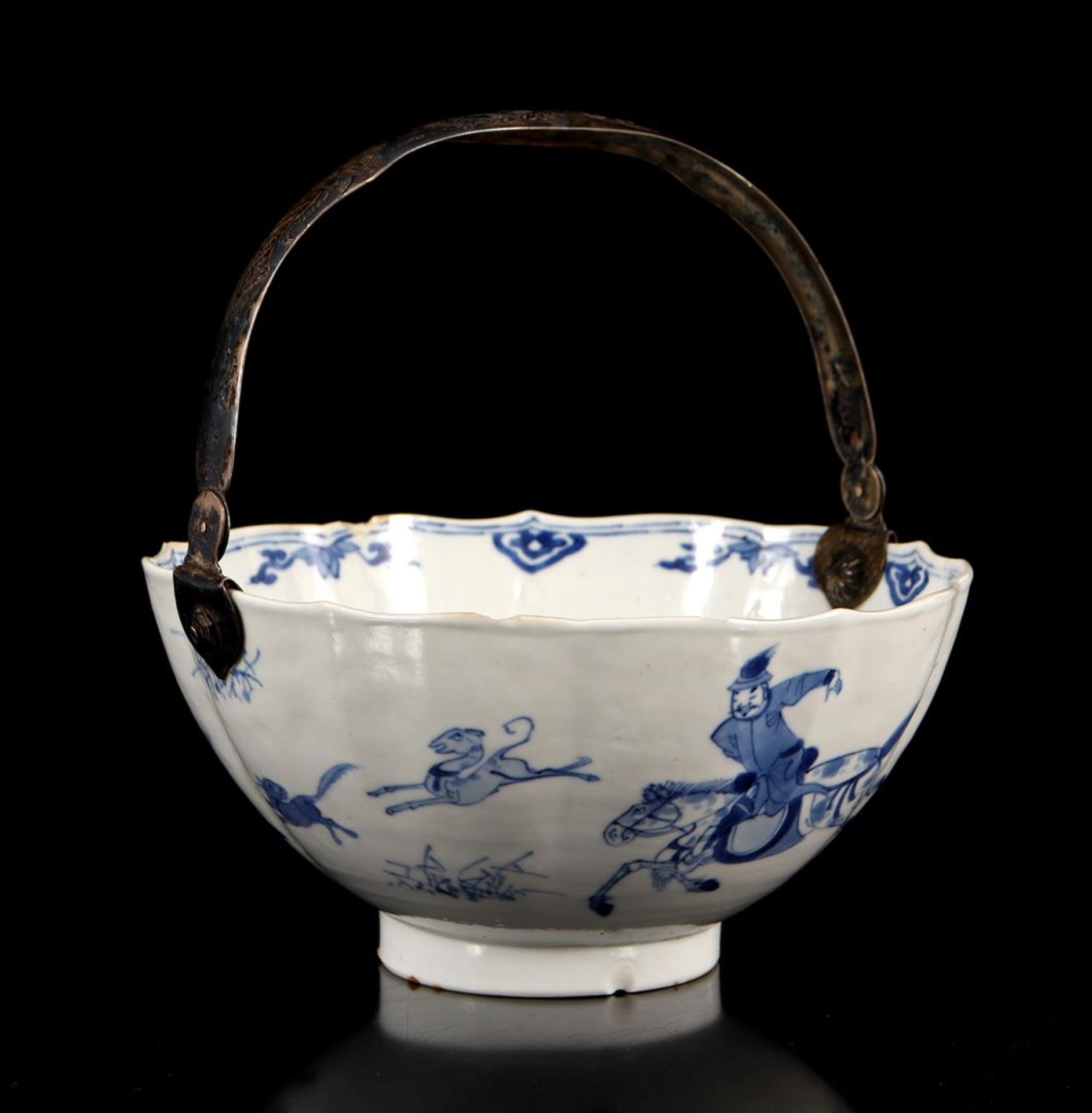 Chinese porcelain lobed bowl with images of hunters