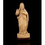 Richly carved ivory figurine of Christ