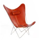 Cognac-colored leather butterfly chair