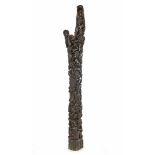 African blackened wooden bombarded sculpture