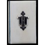 Notebook with ivory cover with applique