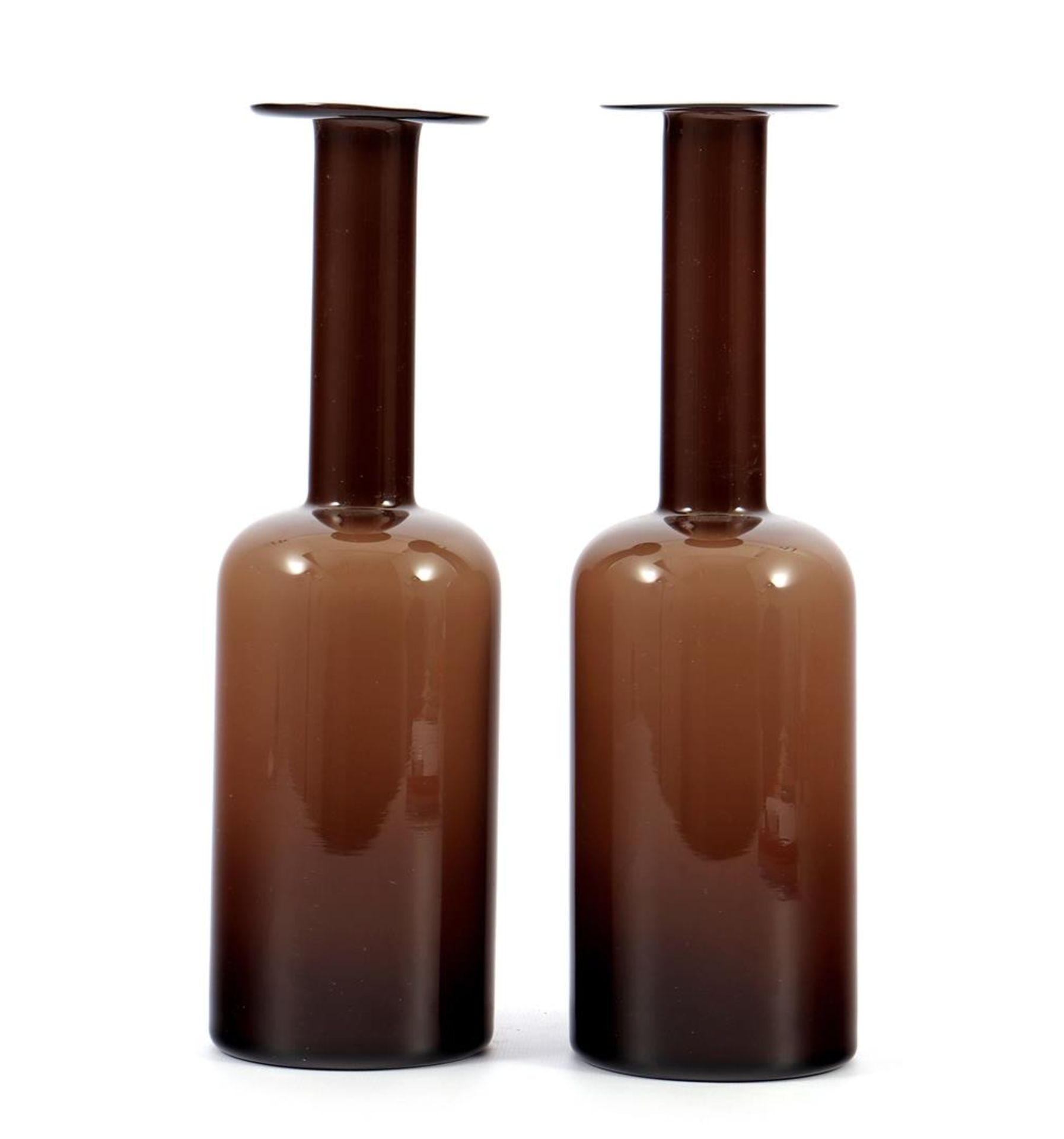 2 brown / white glass bottles