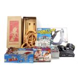 Box with Artin racetrack, Fischer Technik toys, Nintendo 64 and Sliedrecht gymnastics kit