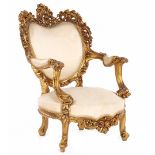 Classic gold-colored armchair with rich stitching