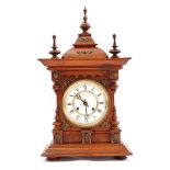 Hermle table clock in walnut case