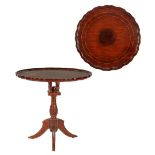 Round walnut table with painted top