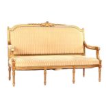 Classic sofa with striped upholstery and gold-colored frame