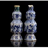 2 Chinese porcelain octagonal vases decorated with landscapes, symbolic objects and flowers, Kangxi