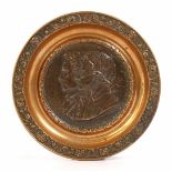 Bronze richly decorated dish with double portrait in the middle 22.5 cm diameter
