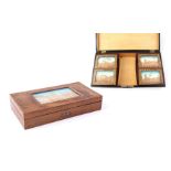 Mahogany veneer music box for card game, with intarsia and representation of cork made under glass i