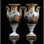 2 late 19th century gold-colored Empire vases with swan necks and decoration of a Mediterranean lan