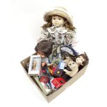 Box with dolls and cars