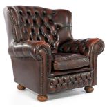 Brown leather Chesterfield armchair