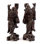 2 carved wooden statues, China ca.1925, 35 cm high