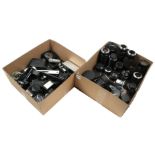 Box with various lenses for cameras and box with flashes and accessories for cameras