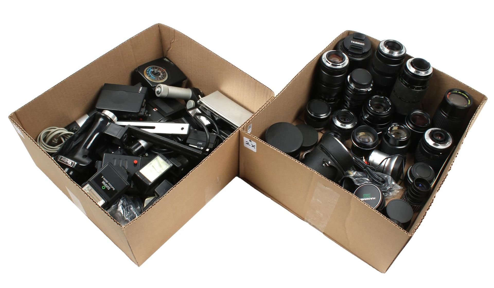 Box with various lenses for cameras and box with flashes and accessories for cameras