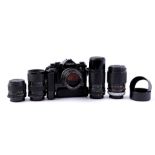 Canon A1 single lens camera with five lenses and motor drive