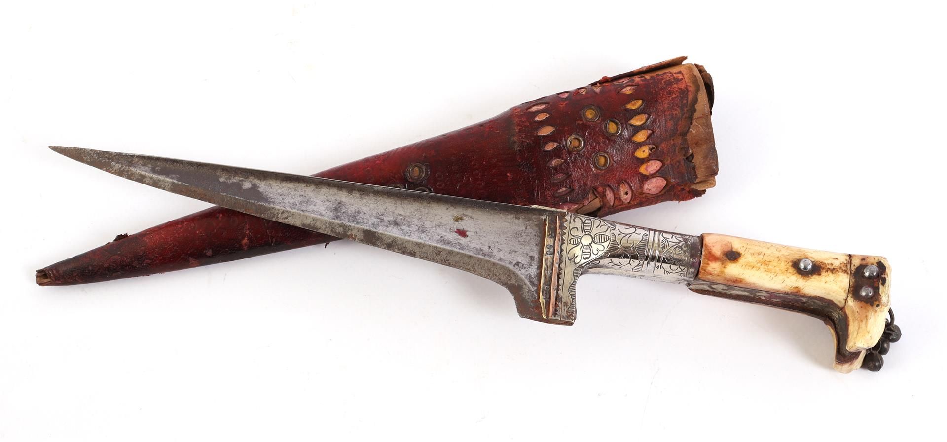 Indo-Persian dagger Pesh-Kabz. Strong blade and hilt of decorated light metal and bone. The wooden s