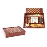 Walnut box with miniature games including ivory parts, Europe approx. 1890, outer size 18x13x3.7 cm,