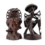Coromandel wooden bust of a lady, Indonesia 32 cm high and a statue of a agricultural worker 36 cm
