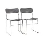 2 chromed metal stacking chairs
