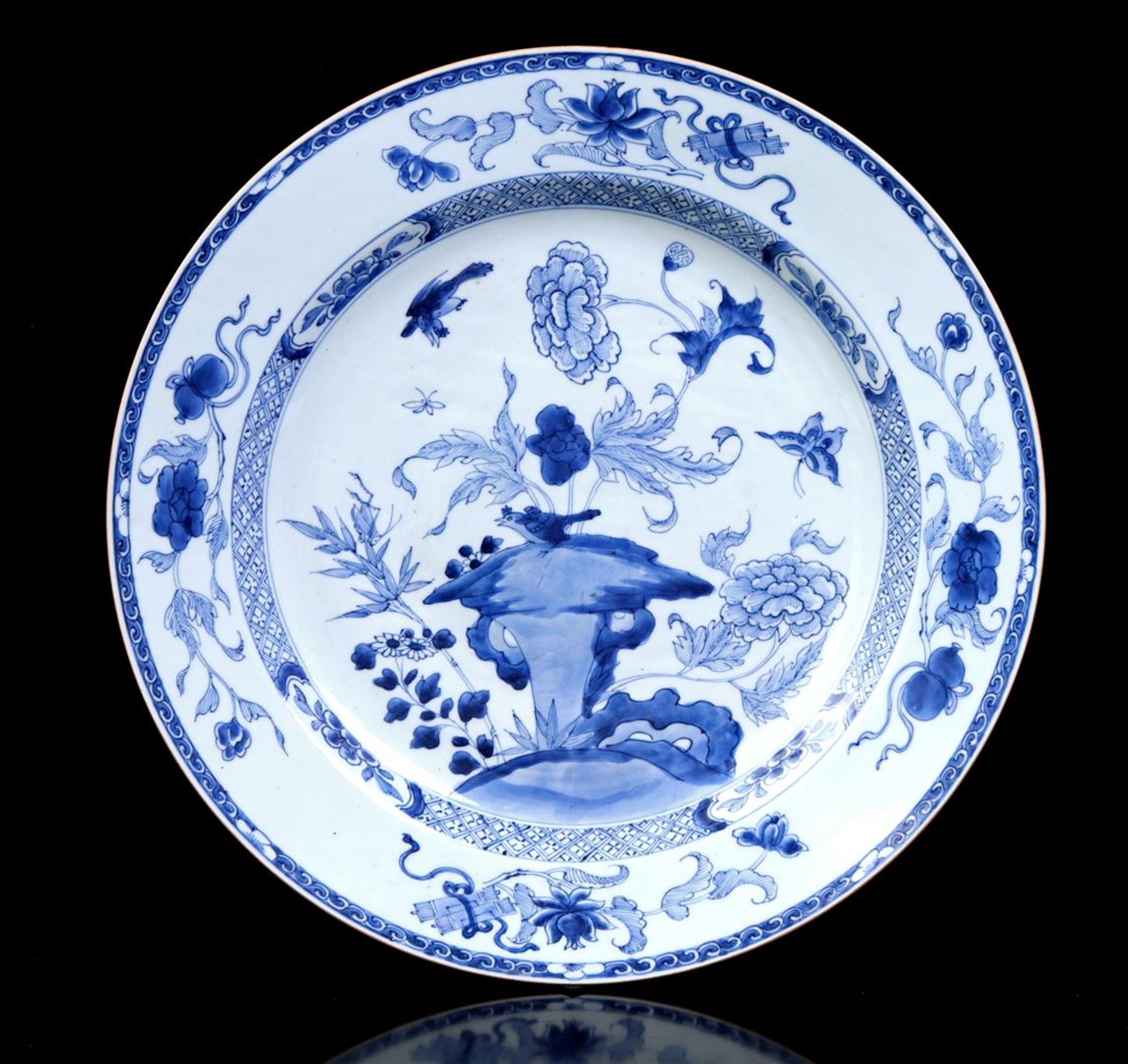 Porcelain dish with blue decoration with flowers and bird, China ca.1775, diameter 42 cm (intact)