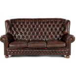 Brown leather padded Chesterfield sofa