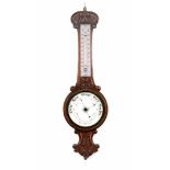 English aneroid barometer in oak case