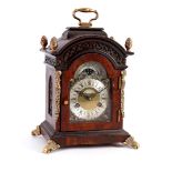 James Powell table clock in walnut veneer cabinet