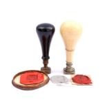 Ivory wax stamp with family crest, Europe ca.1880, 9.5 cm, 81.2 grams with 3 wax stamps and the same