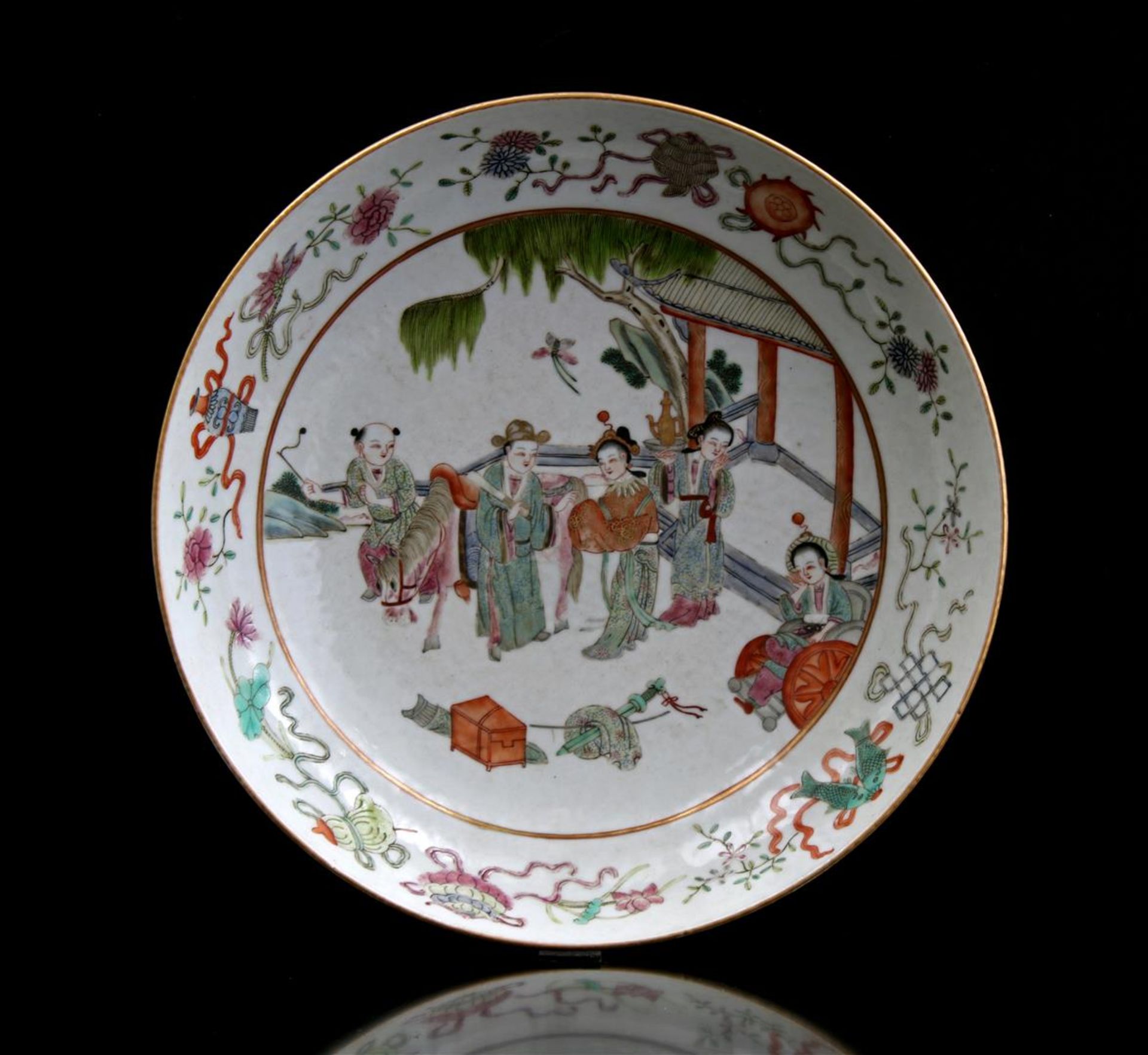 Porcelain dish with beautiful decoration of women in a landscape, China ca.1900, 5.5 cm high, 25 cm