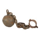 Old iron bullet with chain for prisoners