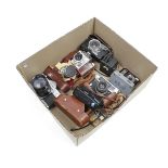 Box with cameras including Exa, Petri TTL, Yashica and Samsung