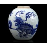 Asian porcelain ginger jar with blue decoration of foo dogs 25.5 cm high, 24 cm diameter (crack in t