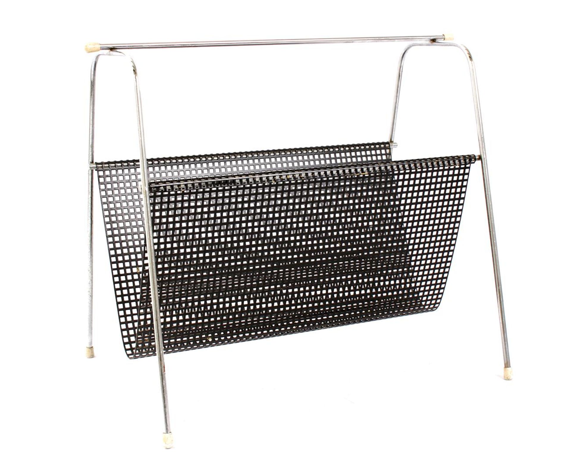 Metal magazine rack with chromed legs