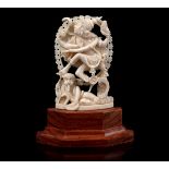 Ivory carving with fantasy figures, India ca.1925, 10x7x3 cm, 41.8 grams. With certificate