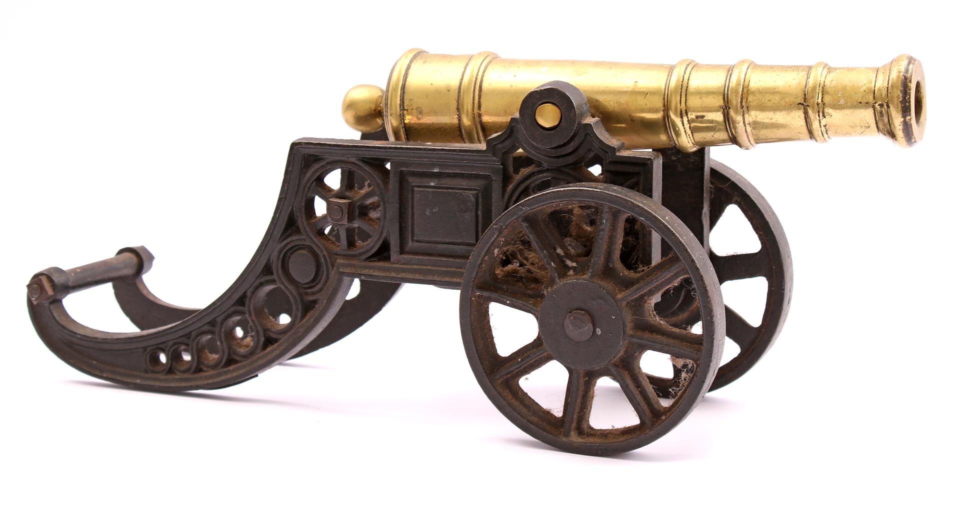 Bronze miniature cannon on cast iron gun carriage 22 cm high, 45 cm wide