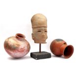 Terracotta head on stand