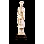 Carved ivory statue of a man with a beard