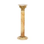 Onyx pedestal with brass elements