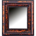 Faceted mirror in a frame