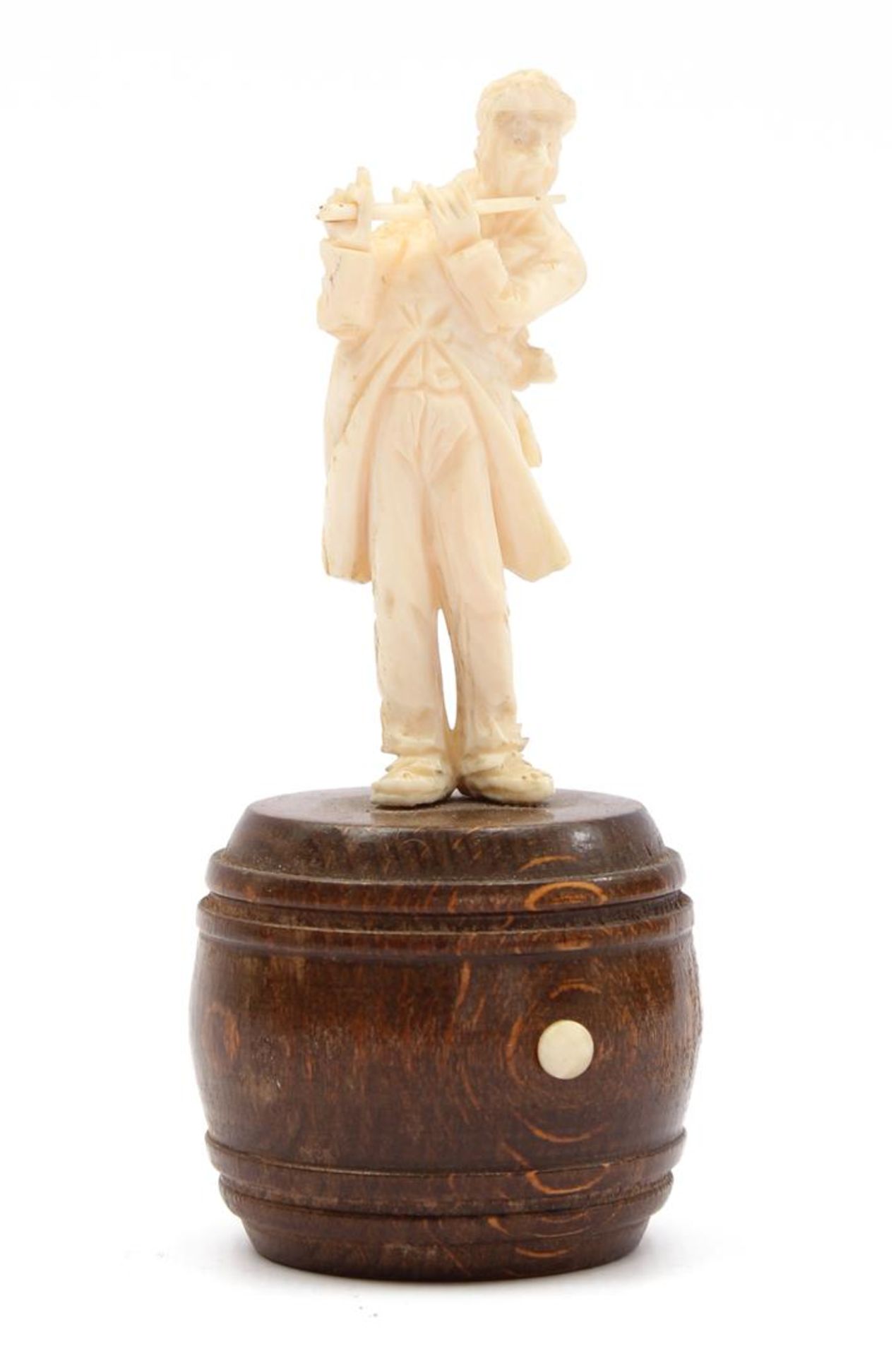 Richly carved ivory figurine of a man