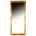 Faceted mirror in gold-coloured classic frame