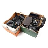 2 boxes of various analog cameras and lenses