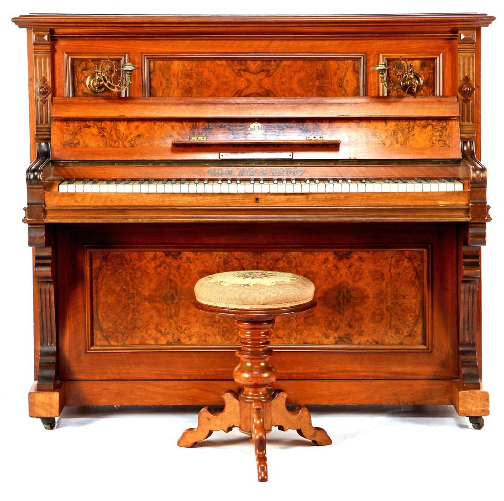 Piano in a walnut with burr walnut veneer case